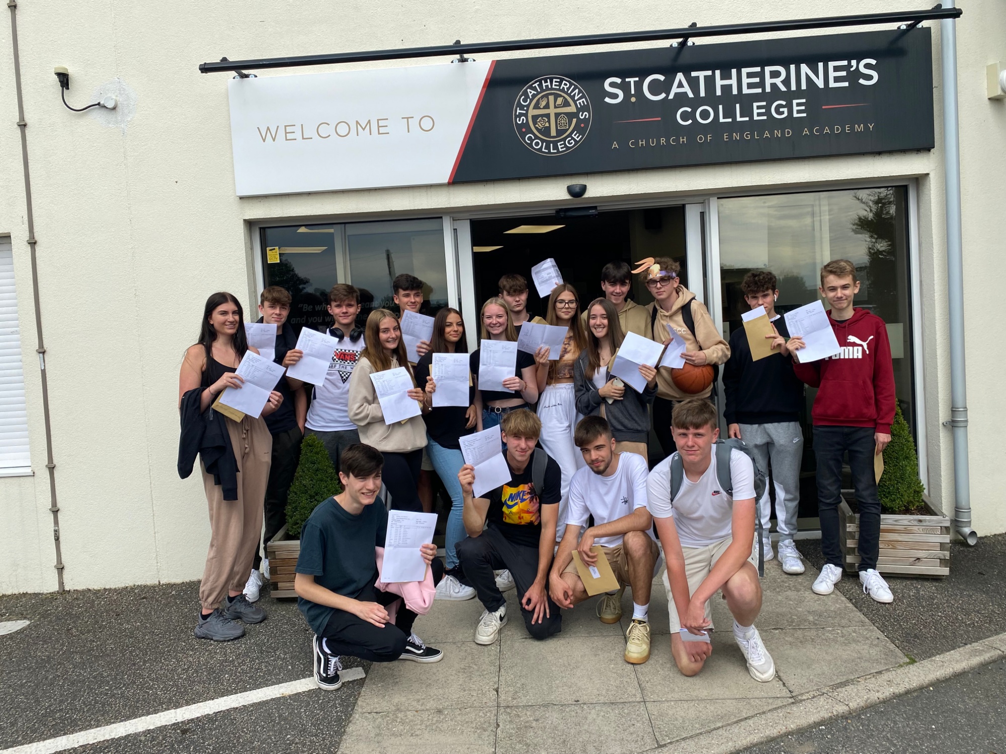 St Catherine's College students celebrating their exam results
