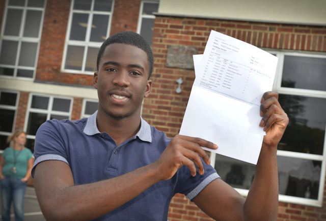 Boy holding results